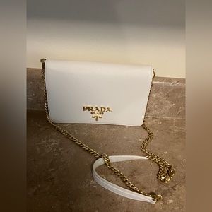 Prada Saffiano Leather Mini Bag with authenticity card and other Prada items